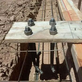 Anchor bolts in trench.jpg